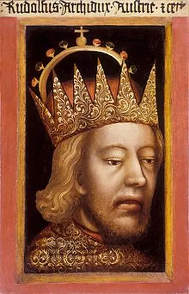 Rudolf IV of Austria. This portrait is the first half frontal portrait of the Occident. It had been on display above his grave in the Stephansdom of Vienna for several decades after his death, but can now be seen in the Museum of the Roman Catholic Archdiocese of Vienna. Apart from the (invented) archdukal crown, the foreshortening of which the artist did not completely master, the portrait is completely realistic. Even the duke's incipient facioplegia is shown.