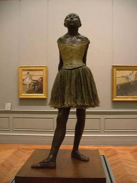 Edgar Degas: Little Dancer of Fourteen Years, cast in 1922 from a mixed-media sculpture modeled ca. 1879–80, Bronze, partly tinted, with cotton skirt and satin hair ribbon, on a wooden base, Metropolitan Museum of Art, New York City
