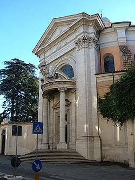 Façade of Sant'Andrea al Quirinale, bearing crest of Cardinal Camillo Francesco Maria Pamphili. (Photo by Croberto68, 2008)