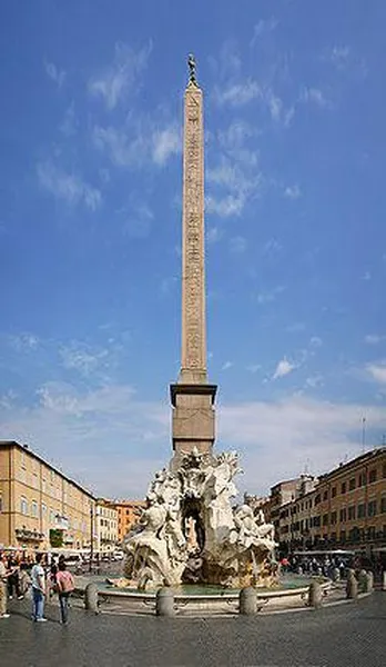 The "Fontana dei Quattro Fiumi" (Fountain of the four rivers) by Gianlorenzo Bernini in piazza Navona in Rome, Italy, topped by the "obelisk of Domitian". (Picture by Stefan Bauer, 2005)