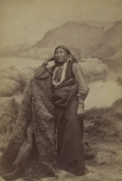 Comanche warrior and medicine man. Reservation cabinet card photo created and published by W. P. Bliss around 1880. DeGolyer Library, Southern Methodist University